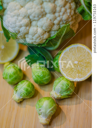 Fresh Cauliflower, Brussels Sprouts, and Lemon - Vibrant Healthy Vegetables Mix. High quality photo 119758163