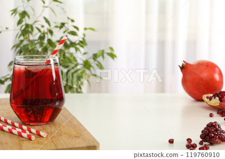 Pomegranate juice, tasty and delicious beverage, fresh drink Pomegranate juice, tasty and delicious beverage, fresh drink 119760910