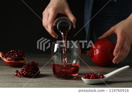 Pomegranate juice, tasty and delicious beverage, fresh drink Pomegranate juice, tasty and delicious beverage, fresh drink 119760916