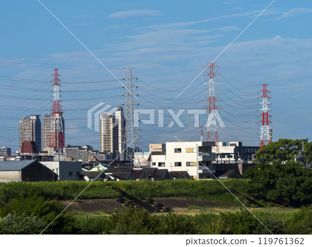 Town along the Yamato River and power transmission towers Town along the Yamato River and power transmission towers 119761362