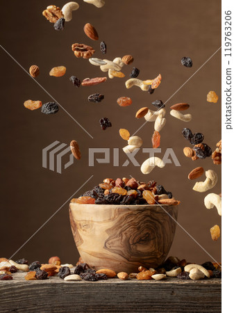 Flying dried fruits and nuts. Flying dried fruits and nuts. 119763206