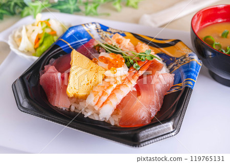 Bowl of rice topped with sashimi Bowl of rice topped with sashimi 119765131