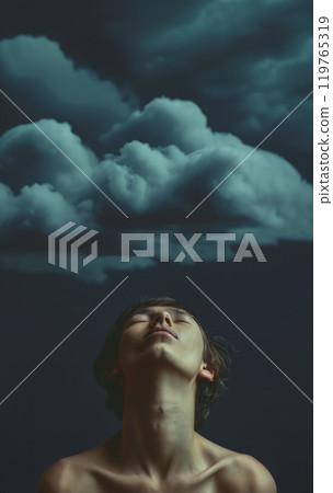 Conceptual depiction of a believing person, head turned towards heaven, radiating inner peace, calm equilibrium and hope 119765319