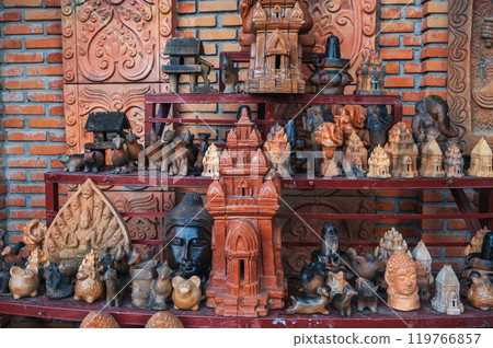 Buddhist religious clay figurines and pottery in souvenir shop on Po Nagar Cham Towers in Nha Trang, Vietnam Buddhist religious clay figurines and pottery in souvenir shop on Po Nagar Cham Towers in Nha Trang, Vietnam 119766857