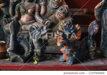 Clay dragon figurines in souvenir shop in Vietnam in Asia 119766860