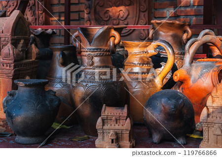 Antique clay pots, vases and jugs in pottery workshop in Vietnam in Asia Antique clay pots, vases and jugs in pottery workshop in Vietnam in Asia 119766866