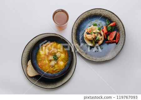 Balanced meal with soup, grilled vegetables, salad, and herbal tea. Perfect for a nutritious lunch Balanced meal with soup, grilled vegetables, salad, and herbal tea. Perfect for a nutritious lunch 119767093