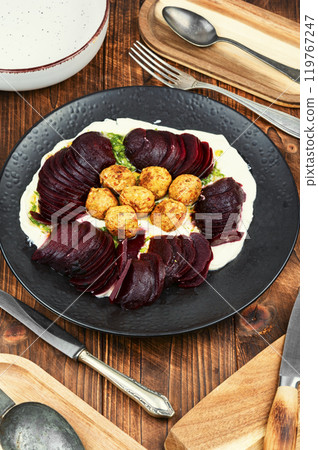 Plate of falafel balls with vegetables. 119767247