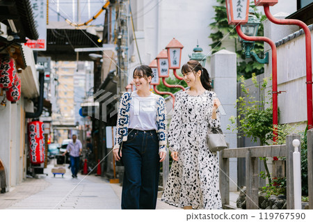 A woman walking in Minami, Osaka 119767590