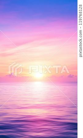 serene sunset over ocean creates beautiful gradient of pink and purple hues in sky, reflecting softly on calm waters surface serene sunset over ocean creates beautiful gradient of pink and purple hues in sky, reflecting softly on calm waters surface 119768128