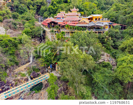 The Buddhist temple in the rock. 119768631