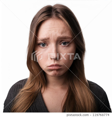 Disappointed woman's face 119768774