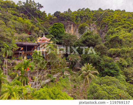 The Buddhist temple in the rock. 119769137