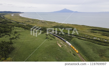 THE ROYAL EXPRESS runs with a view of Rishiri Island THE ROYAL EXPRESS runs with a view of Rishiri Island 119769997