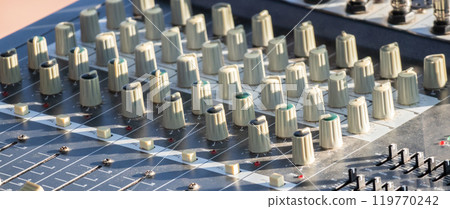 Close up of sound audio mixing system Close up of sound audio mixing system 119770242