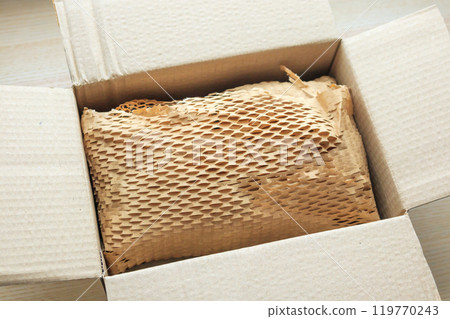 Eco friendly brown paper honeycomb wrap for product packaging parcel carton box Eco friendly brown paper honeycomb wrap for product packaging parcel carton box 119770243