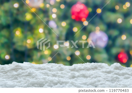 Empty white snow with blur Christmas tree with bokeh light background Empty white snow with blur Christmas tree with bokeh light background 119770483