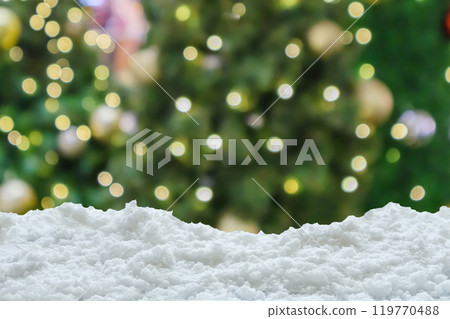 Empty white snow with blur Christmas tree with bokeh light background 119770488