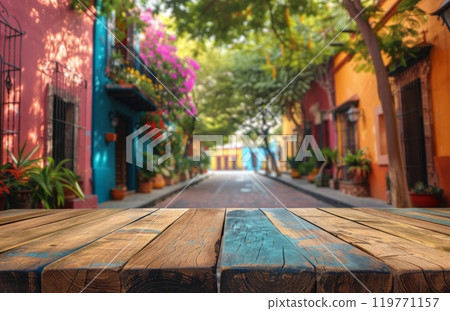 Colorful Street Scene With Wooden Table in Mexico 119771157