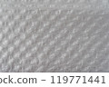 Recycled perforated white paper close up texture 119771441