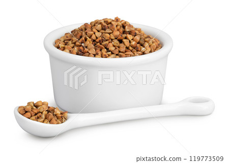 Raw buckwheat in ceramic bowl isolated on white background Raw buckwheat in ceramic bowl isolated on white background 119773509