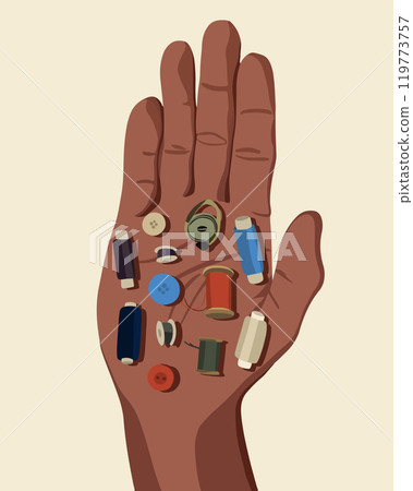 A hand displays a compact sewing kit featuring different colored threads and buttons 119773757
