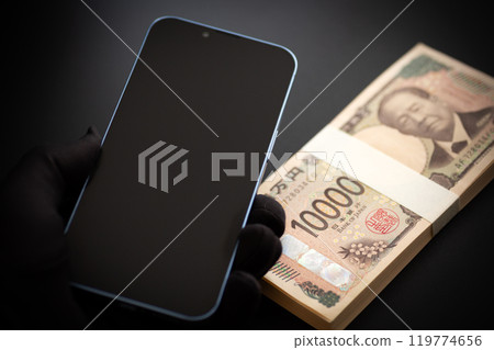 Hands, smartphone and computer of a criminal stealing money Hands, smartphone and computer of a criminal stealing money 119774656