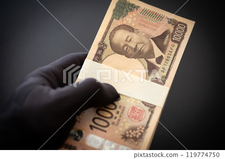 Hands of criminals stealing money 119774750