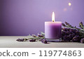 A Peaceful Lavender Candle Illuminating a Serene  119774863