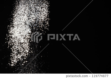 Abstract black and white background of pouring flour, space for text Abstract black and white background of pouring flour, space for text 119774877