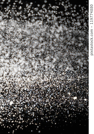Abstract black and white background of pouring flour, space for text 119774880
