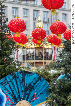 Street is decorated with red lanterns and blue fan to celebrate Chinese New Year 119775192