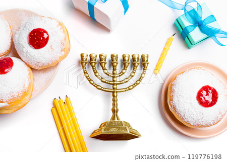 Hanukkah Menorah, candles and sufganiyah jelly donuts Hanukkah Menorah, candles and sufganiyah jelly donuts 119776198
