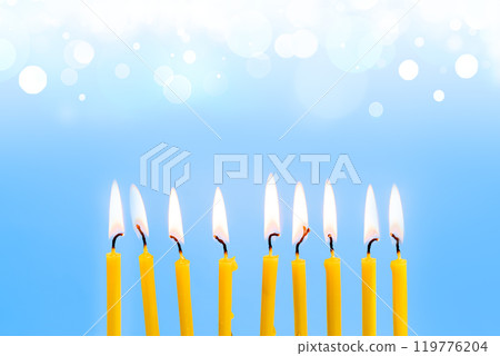 Hanukkah Menorah, burning candles on blue background 119776204