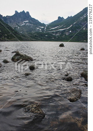 Twilight on the shore mountain lake Zolotarnoye in Ergaki nature park Twilight on the shore mountain lake Zolotarnoye in Ergaki nature park 119776227