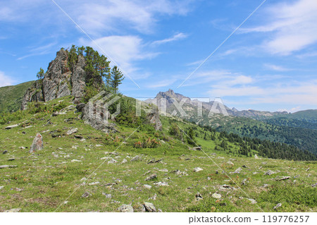 Green summer mountain landscape, blue sky with white clouds Green summer mountain landscape, blue sky with white clouds 119776257