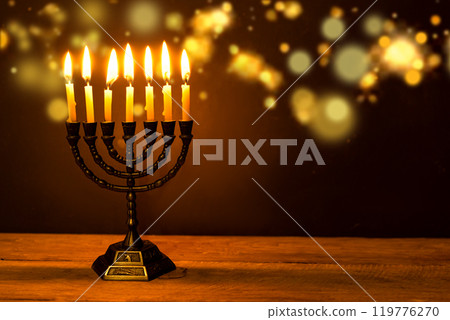 Hanukkah Menorah with burning candles 119776270