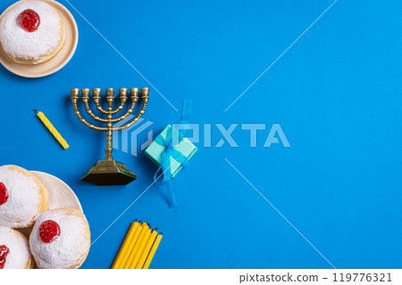 Hanukkah template with Menorah and sufganiyah jelly donuts 119776321