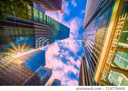 Tokyo cityscape in Japan. The morning sun shines into the Otemachi office district. On the right is Otemachi One... a ray of hope = October 27th 119776468