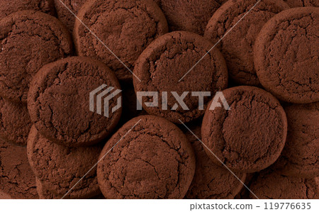 Chocolate brownie cookies background, Chocolate cookies round shape taken from above, close up. Chocolate brownie cookies background, Chocolate cookies round shape taken from above, close up. 119776635