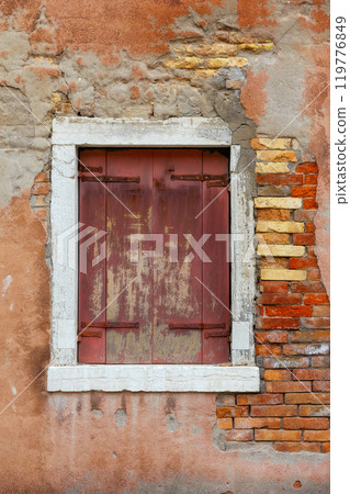 Old red brick wall with closed window Old red brick wall with closed window 119776849