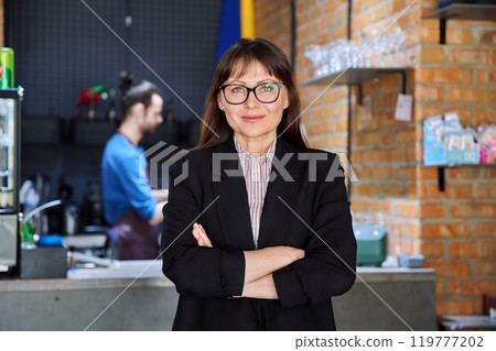 Portrait of confident business woman, accountant, lawyer, coffee shop cafeteria restaurant owner 119777202