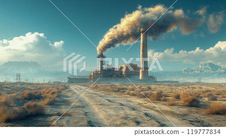 A large industrial power plant with smokestacks releasing smoke, set against a dry, desert landscape 119777834