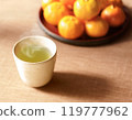 Green tea and mandarin oranges 119777962
