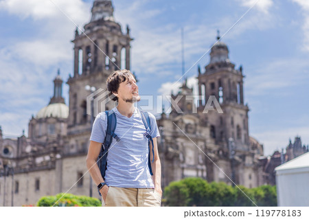 Male tourist in front of Catedral Metropolitana de la Ciudad de Mexico. Cultural exploration, historic architecture, and travel experience concept 119778183