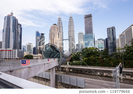 KUALA LUMPUR, MALAYSIA - AUGUST 29, 2024: Awesome Saloma Link bridge at Kuala Lumpur. Amazing view of skyscrapers in Kuala Lumpur, Malaysia. Kuala Lumpur is a popular tourist destination of Asia. KUALA LUMPUR, MALAYSIA - AUGUST 29, 2024: Awesome Saloma Link bridge at Kuala Lumpur. Amazing view of skyscrapers in Kuala Lumpur, Malaysia. Kuala Lumpur is a popular tourist destination of Asia. 119779688