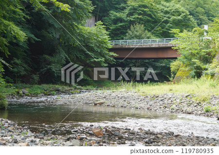 Countryside river and bridge Countryside river and bridge 119780935