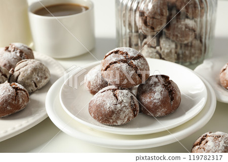 Delicious crinkle cookies in a plate, on a light background. Delicious crinkle cookies in a plate, on a light background. 119782317