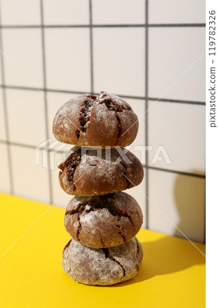 Appetizing Grinkle cookies on a yellow background. 119782326