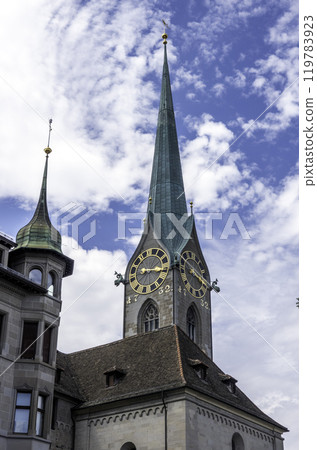 Close view of clock tower with blue sky in Zurich, Switzerland 119783923